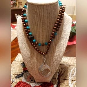Handcrafted wood bead necklass.
